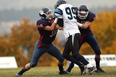 What is the Difference Between Football Cleats and Soccer Cleats?